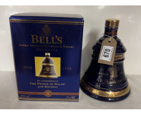 A boxed Bells extra special old Scotch whiskey decanter 'The Prince of Wales 50th birthday' 