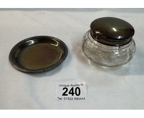 A silver topped trinket pot and a silver pin tray.