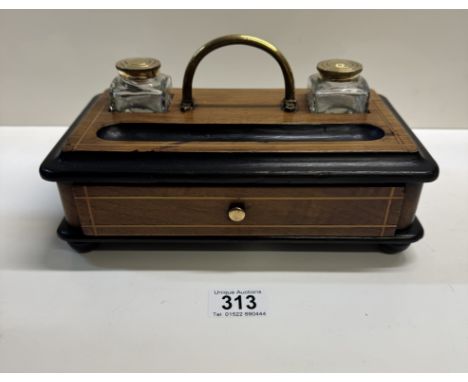 A desk tidy inkwell with a drawer 