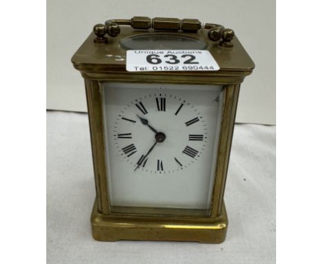 An Edwardian brass carriage clock with key 