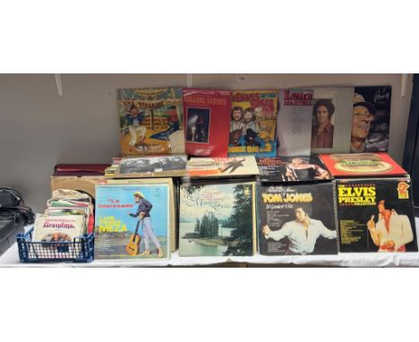 A large quantity of LP's including Tom Jones, Rolling Stones &amp; Elvis etc.