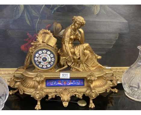 A good French Sevres painted panel gilded mantle clock 
