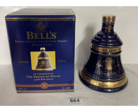 A boxed Bells extra special old Scotch whiskey decanter 'The Prince of Wales 50th birthday' 