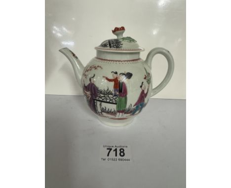 A Circa 1770 Worcester teapot &amp; lid, painted in colours with a group of Chinese figures in a garden, the cover with a flo