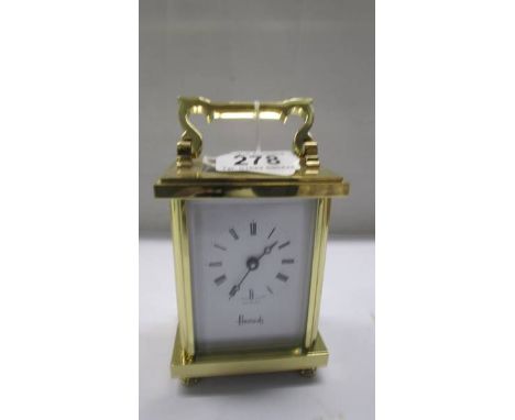 A good brass carriage clock from Harrods in working order. 