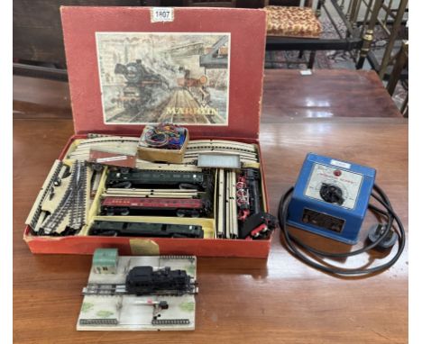 A boxed Marklin HO train set with extra pieces 