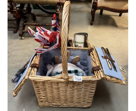 A picnic hamper with contents &amp; a bottle of alcohol free merlot wine 