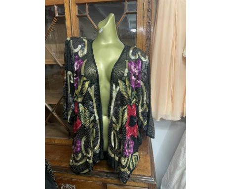 A sequin embellished floral long sleeve shrug/jacket by Sudi, England, size M/L &amp; a beaded &amp; sequin top in black &amp