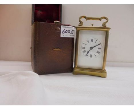 A French half hour repeater brass carriage clock in case. 