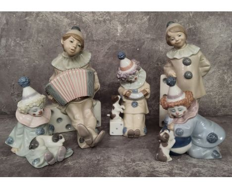 Five Lladro clown figures including&nbsp;Girl with Domino, No. 1175;&nbsp;Boy with Accordion on Domino, No. 1179; others smal