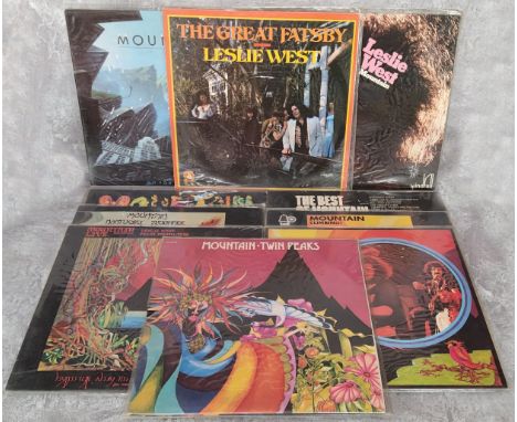 Mountain vinyl LPs including Climbing, Bell SBLL 133; Flowers of Evil, Island Records pink rim label, ILPS 9179; Nantucket Sl