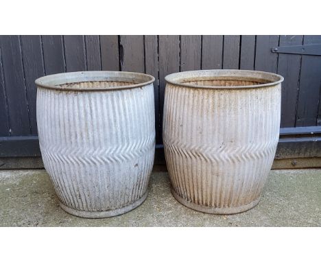 A pair of galvanised dolly tubs, pierced bases for garden planter use 