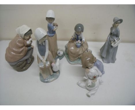 Group of six Nao ceramic figures depicting various girls, children etc 