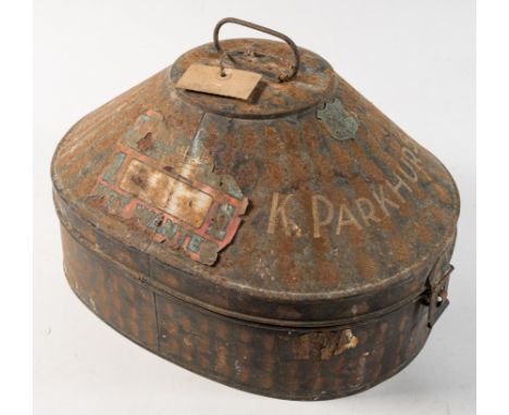 A lacquer hat tin by Gieves, London, inscribed 'F Parkhurst': together with a Wolseley pattern pith helmet by Gieves, London,