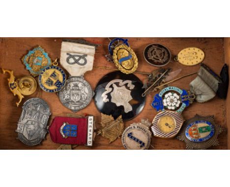 A collection of silver and silver gilt Masonic and other jewels and badges: including a silver and enamel  Royal Institute fo