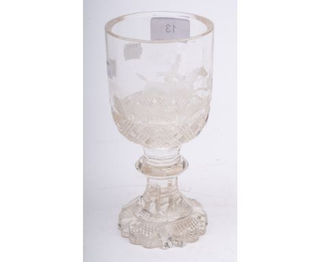 A 19th century cut glass goblet with hunting scene decoration: on a faceted knopped stem, 18.5cm high.
