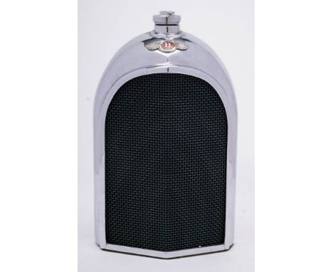 A chrome plated Bentley radiator hip flask by Ruddspeed Ltd: with radiator cap stopper, enameled badge and mesh grill, 20cm. 