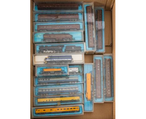 Atlas N gauge. A boxed group of American outline locomotives and passenger coaches: including Pennsylvania Dumu unit and nine