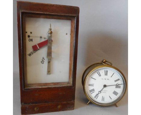 Kay & Co, Paris, a G.W.R. brass cased timepiece: stamped 3303, the 9cm enamel Roman dial  marked G.W.R., the circular movemen
