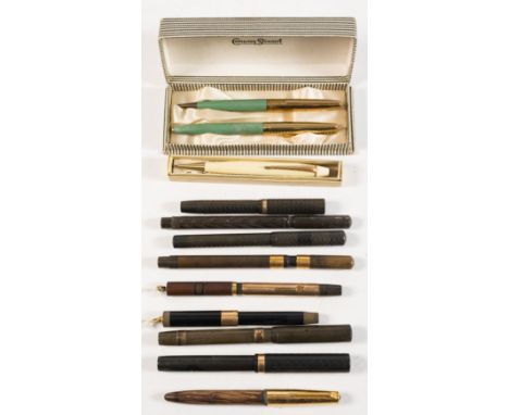 A group of nine vintage fountain pens: including a Waterman's 9ct gold mounted pen with personalised inscription, together wi