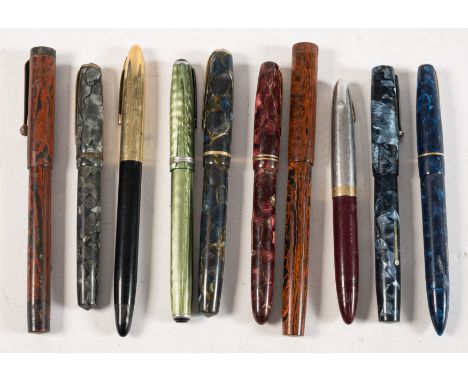 A group of ten vintage fountain pens: including a Blackbird Self- filling pen by Mabie, Todd & Co Ltd, blue marble, one other