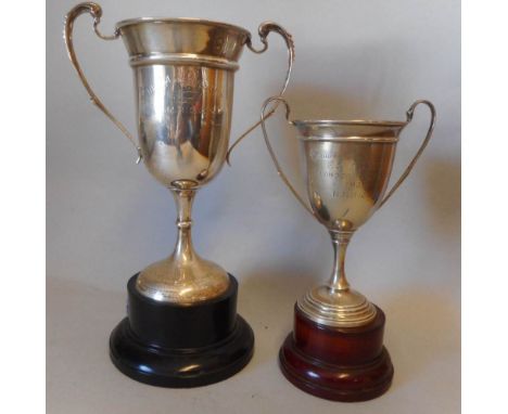 A George V silver twin handled trophy cup, maker's mark worn, London, 1926: inscribed The V.Anstone Cup, 1927, H.M.Hicks heig
