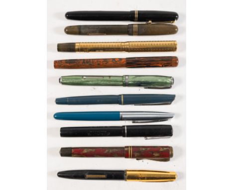 A group of ten vintage fountain pens: including a Swan 'SF2' self -filler by Mabie, Todd & Co Ltd . orange / black marble, a 