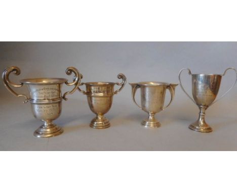 Four small silver trophy cups, various makers and dates: awarded to H.M.Hicks, includes; Bath &amp; West of England Motor Clu