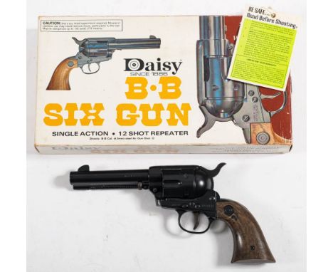 A  Daisy BB six gun single action twelve shot repeater 4.5mm calibre in makers carton:  together with a Kolser single action 