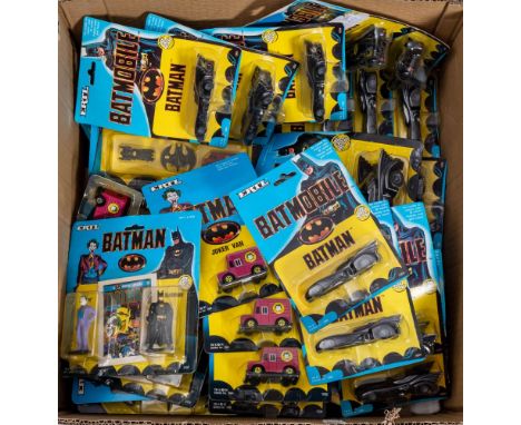 Ertl. A boxed group of Batman and Joker vehicles and figures in blister packs: 