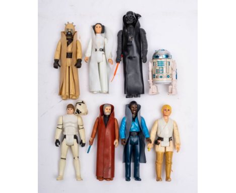 A group of vintage Star Wars figures:  'Darth Vader', ' 'Luke Skywalker', 'Obi Wan Kenobi,' 'Luke Skywaler in Storm tropper o