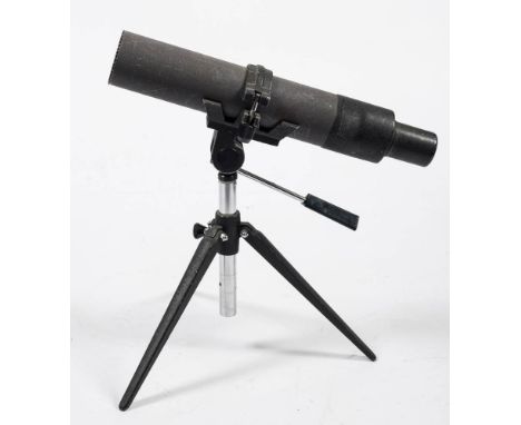 A Greenkat 22x57mm Spotting Scope: on tripod.
