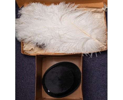 An early 20th century white ostrich feather fan with bone sticks: together with a black felt top hat by Lincoln Bennett &amp;