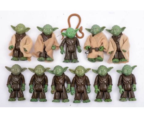 A group of vintage Star Wars figures comprising eleven 'Yoda' figures: 