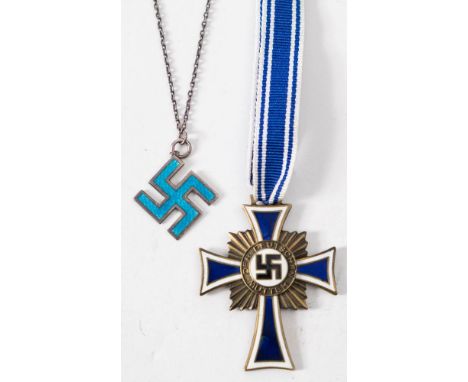 A Reproduction Cross of Honour of the German Mother, together with a silver and enamel swastika: (2) 