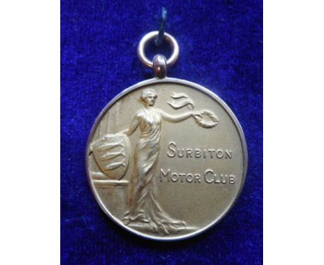 A 9ct gold medal for Surbiton Motor Club: awarded to H. M. Hicks, The Grand Cup Trial 1925, 10.87gms. 