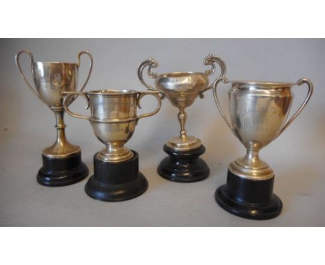 Four small silver trophy cups, various makers and dates: awarded to H.M.Hicks, includes; The Douglas Challenge Cup Trial, 192