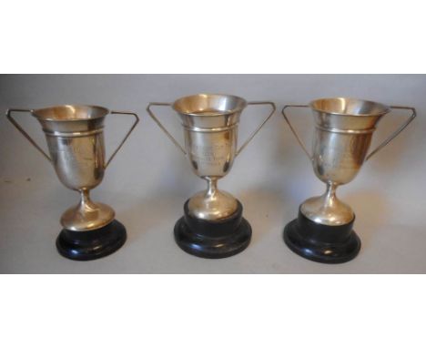 Three silver twin handled trophy cups, maker Charles Boyton & Son  Ltd, London, 1926/27: for the Surbiton Grand Cup Trial 192