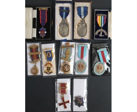 A group of Masonic jewels,: including a silver and enamel RMIG breast badge, a GRV Roll of Honor  badge, a Hong Kong Lodge je