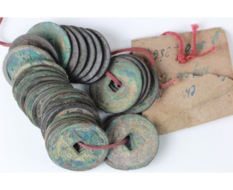 Chinese cash, strung with very old ticket/packet attatched, c.30