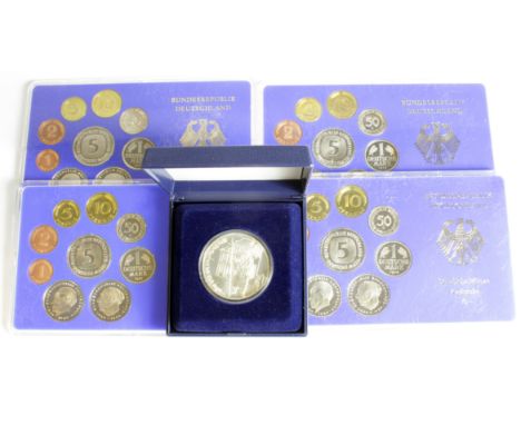 Germany : 3x 1976 Proof Sets, 1x 1978, and a 23g sterling silver medal cased.
