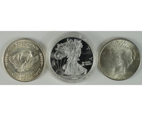 USA (3): Peace Dollar 1925 EF, and 2x 1oz silver rounds.