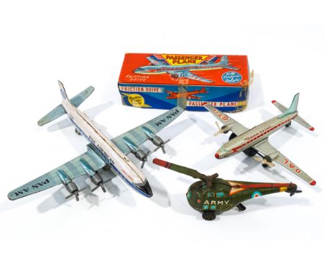  Pan American tin plate aeroplane, designed as a Clipper Fortuna, together with a tin plate Army helicopeter and an overseas 