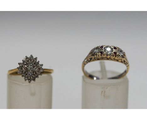 A twenty one stone diamond 18 carat gold ring, 2.1g gross and a 9 carat gold stone set dress ring 2.6g gross