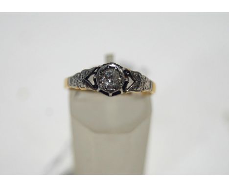 A single stone diamond ring, stamped '18ct' and 'Plat', finger size N, 2.5 g gross