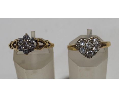 A 9 carat gold cubic zirconia cluster ring; with another similar stamped '9k'; 3.5 g gross