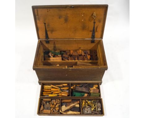 A Victorian painted pine chest containing the wood working tools from W. Stock, many stamped W.Stock, including a rosewood pl