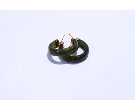 A pair of nephrite jade hoop earrings, stamped '14K', cased