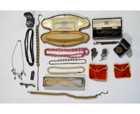 A silver ingot pendant; a silver three bar gate braceleet; and a quantity of costume jewellery