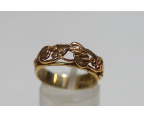 A Clogau Gold 9 carat gold open work fronted ring, finger size O1/2, 4 g gross, cased